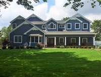 Blue house with home extension